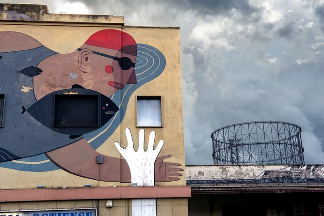 Photo Tour in the Ostiense district: forfeiture and redevelopment - Unique Perspective on Rome’s Industrial Heritage and Urban Art
