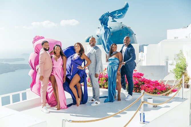 Photoshoot in Flying Dresses in Santorini - Dive Into a Unique Santorini Photoshoot with Flying Dresses