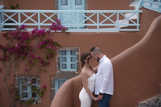 photoshoot in Santorini Oia - Starting at The Virgin Mary of the Akathist Hymn Church in Oia