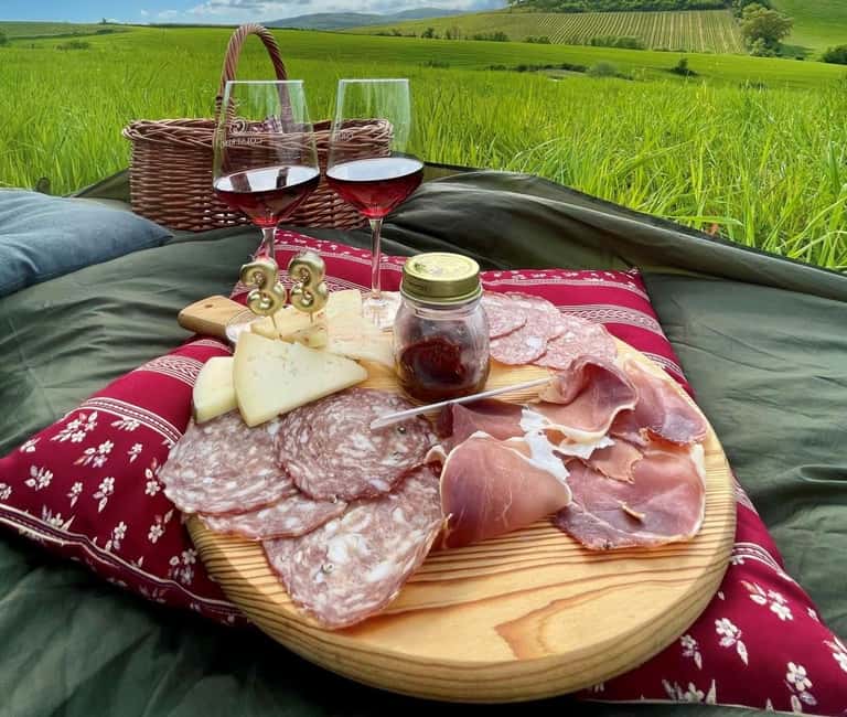 Picnic in vineyards with Bottle of Brunello di Montalcino - The Vineyards of Montalcino: A Scenic Setting for Your Picnic