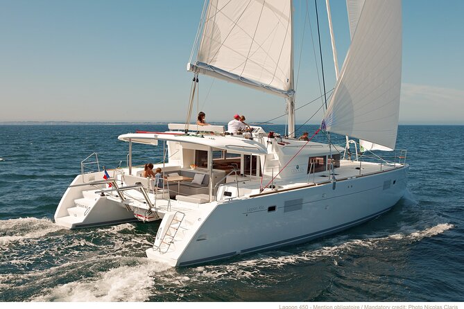 Platinum Santorini Cruise Catamaran with BBQ & Open Bar - Starting Point with Effortless Transfers from Santorini Hotels