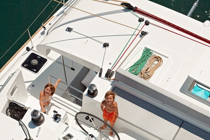 Platinum Santorini Cruise Catamaran with BBQ & Open Bar - Exploring the Iconic Stops: Ammoudi Bay and Athinios Port