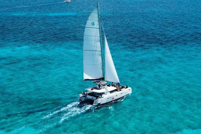 Plus Full Day Catamaran Tour to Isla Mujeres All Inclusive - Key Points