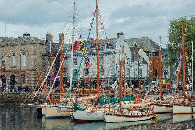Plymouth: Self Guided City Walk and Interactive Treasure Hunt - Sitting in Seats of the Famous Beatles