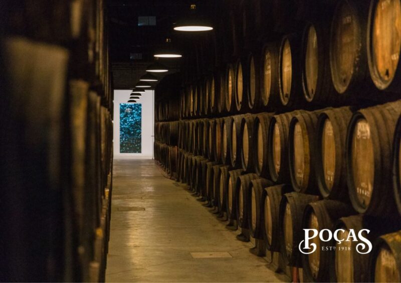 Poças: Guided Tour & Port Wine Tasting with Pastel de Nata - Guided Tour of the Historic Port Wine Cellar