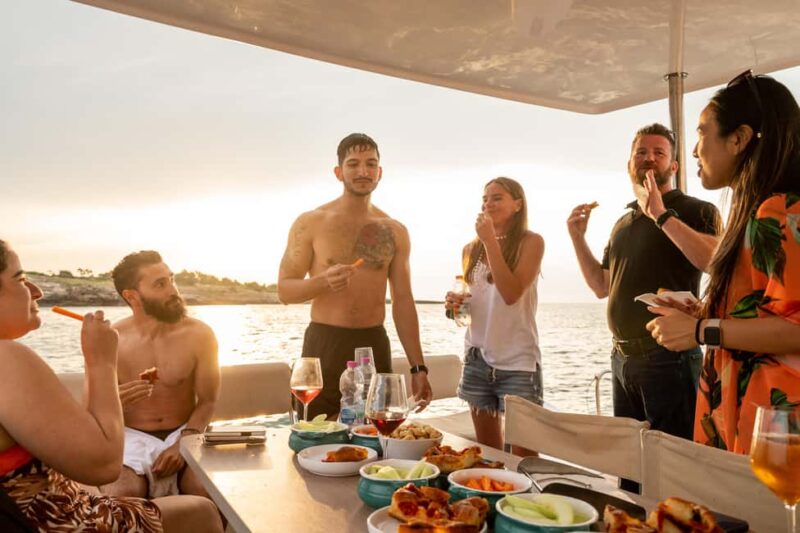 Polignano a Mare: Catamaran Tour with Aperitif & Local Food - Discover Polignano a Mare from the Sea on a Catamaran