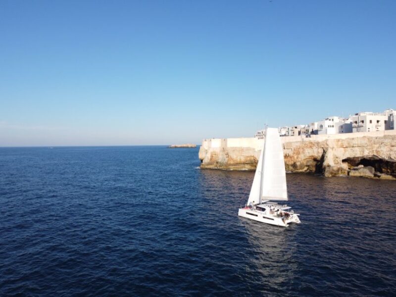 Polignano a Mare: Catamaran Tour with Aperitif & Local Food - Scenic Cruising and Water Activities