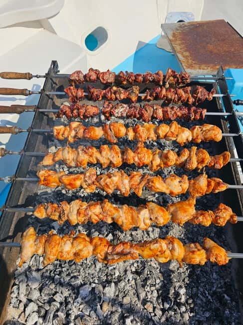 Polis: Blue Lagoon Boat Tour with Optional Barbecue Lunch - Unique Features: The Inflatable Water Slide