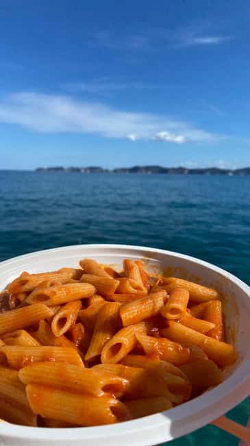 Ponza: Palmarola & Ponza Island Cruise with Swimming & Lunch - Onboard Lunch and the Italian Driver