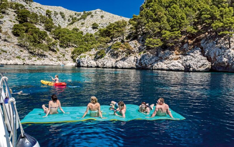 Port d'Alcudia: North Coast Catamaran Cruise with Meal - Water Activities: Kayaks, Paddleboards, and Snorkeling