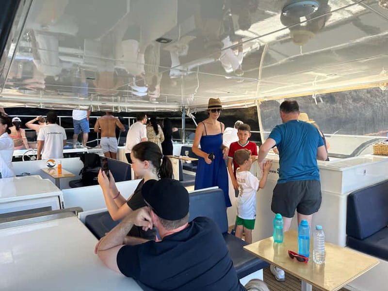 Portimão: Benagil Caves & Golden Coast Eco Catamaran Tour - Refreshing Swim Stop During Summer Months