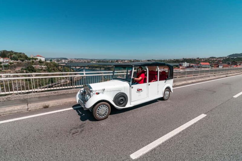 Porto: City Center Eco Car Tour - Explore Portos Iconic Landmarks in a Classic Electric Car
