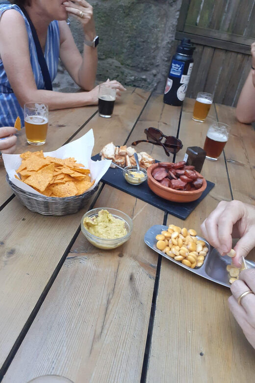 Porto: Craft Beer Tasting Tour with Local Snacks - Starting Point at Praça dos Poveiros in Porto