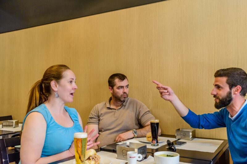 Porto: Delicious Food and Wine Walking Tour - Traditional Portuguese Dishes and Local Delicacies