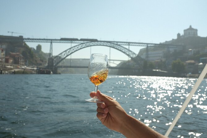 Porto: Douro River Boat Cruise with Port Wine and Snacks - Port Wine Cellars and Waterfront Views in Vila Nova de Gaia