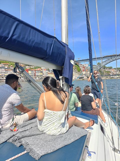 Porto: Exclusive Party aboard a charming sailboat with drink - Exploring the Douro Estuary and Atlantic Ocean