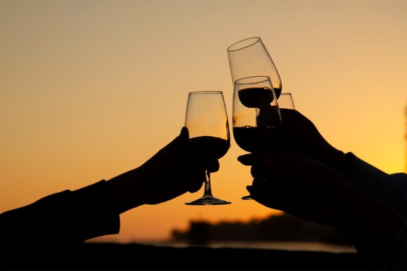 Porto: Port Wine Sunset Boat Tour - Passing Under the Luís I Bridge During the Cruise