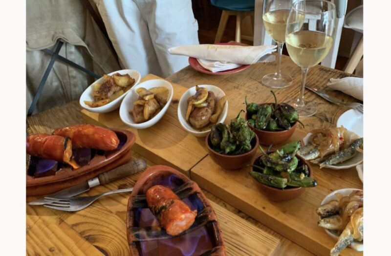 Porto: Premium Portuguese Food Tour and Sightseeing - Wine Tasting at a Local Restaurant