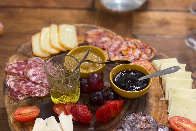 Porto Private Gourmet Food & Wine Historic Tour with a Sommelière - Literary Charm at Livraria Lello