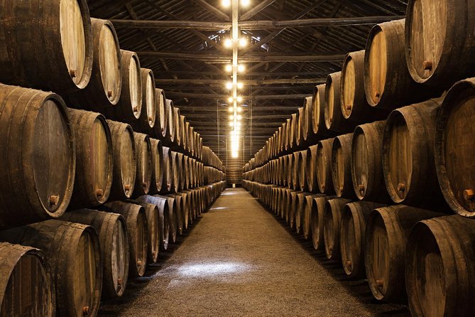 Porto Private Tour from Lisbon with Douro Cruise and Wine Tasting - Free Time at Cais da Ribeira