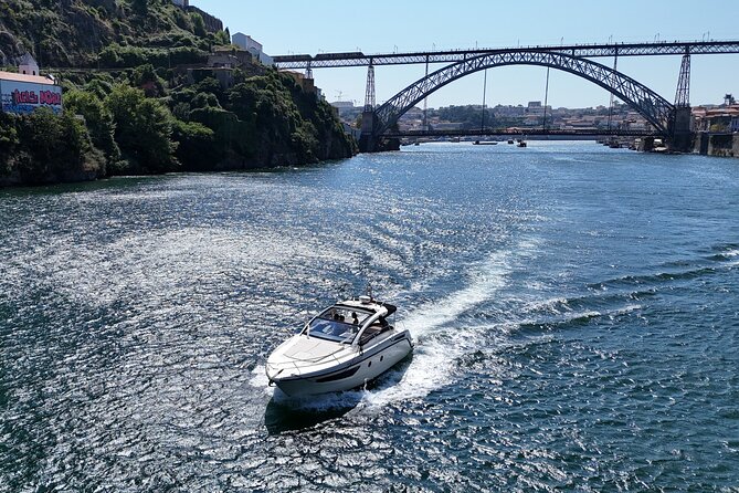 Porto: Private Yacht Cruise with Local Wines and Snacks - Scenic Views of Porto and Gaia from the River