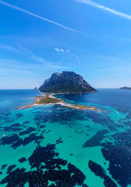 Porto San Paolo: Day Tour to Tavolara and Molara fish-Lunch - Visiting Tavolara Cliffs and the Natural Arch