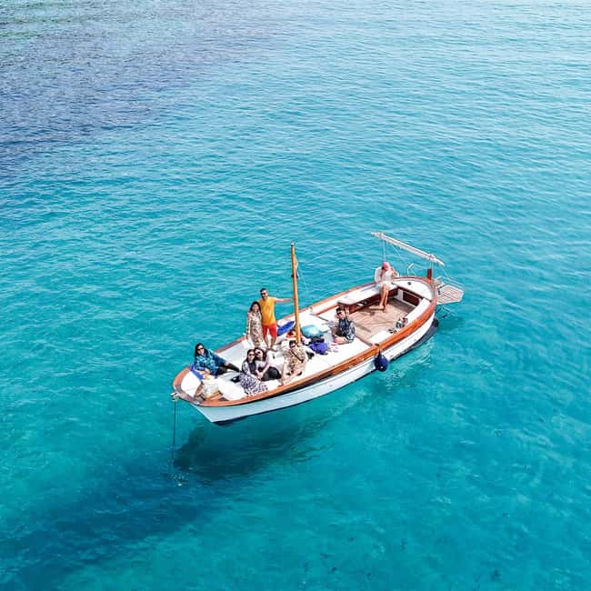 Porto San Paolo: Half Day Boat Tour to Tavolara and Molara - The Stops at Spiaggia del Dottore, Tavolara, and Molara