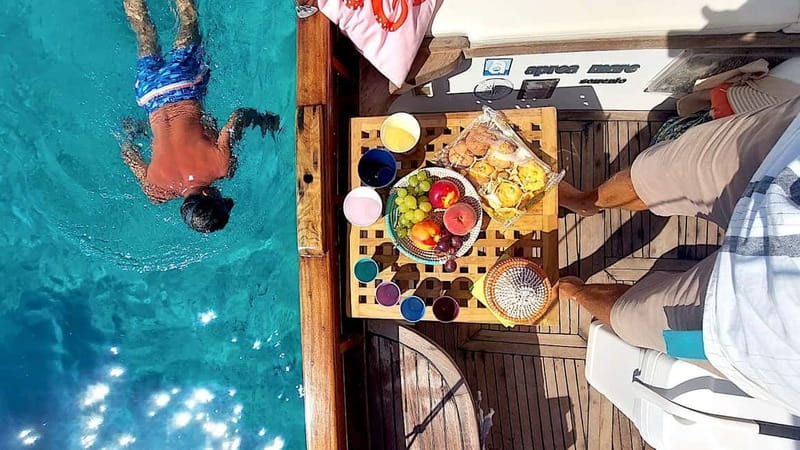 Porto San Paolo: Half Day Boat Tour to Tavolara and Molara - Food, Drinks, and Refreshments on Board