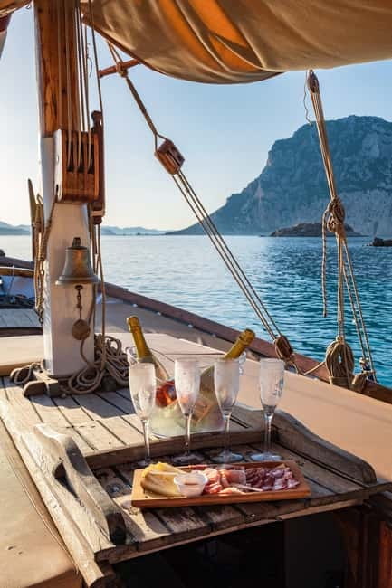 Porto San Paolo: Vintage Cruise Sunset Aperitif to Tavolara - Experience a Sunset Cruise on a Vintage Boat in Sardinia