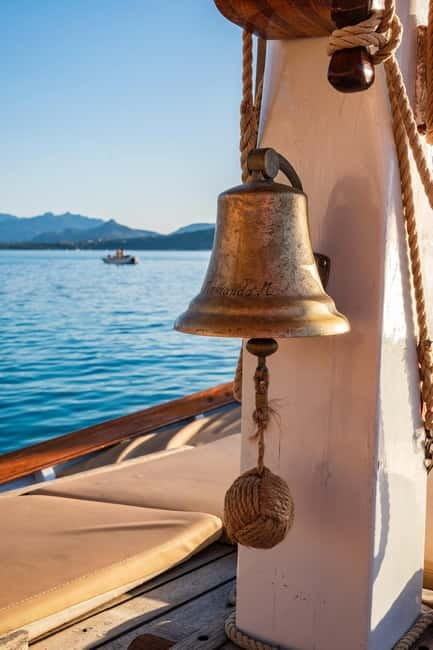 Porto San Paolo: Vintage Cruise Sunset Aperitif to Tavolara - The Guide and Crew Experience