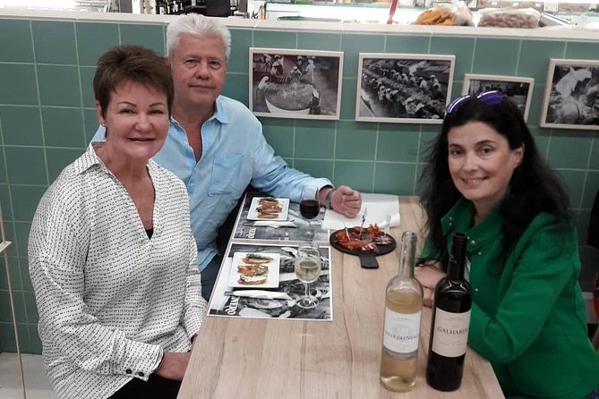Porto Small-Group Local Food, Wine, and Sweets Tasting Tour - Visiting Bolhão Market: Fish, Meat, and Fruits