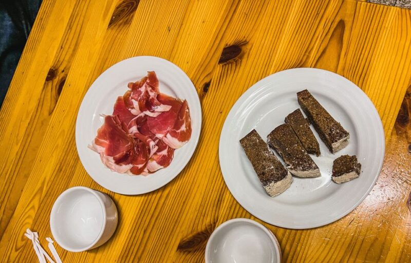 Porto: Walking Dinner Tour with Family-Owned Restaurants - Dining at Portos Best Local Tasca with Green Wine and Family Roots