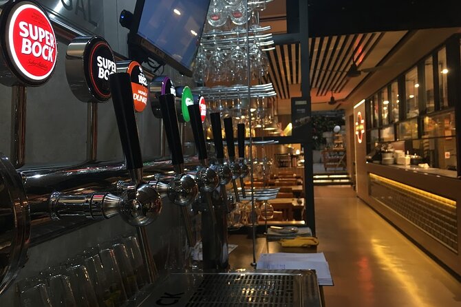 Porto Walking Food Tour With Secret Food Tours - Landmark Visits: From the Casa da Musica to the Clerigos Tower