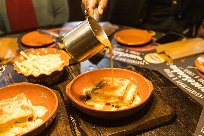 Porto Wine & Dine: Port Wine Cave Food Tour with Eating Europe - Admiring Street Art on R. Guilherme Gomes Fernandes