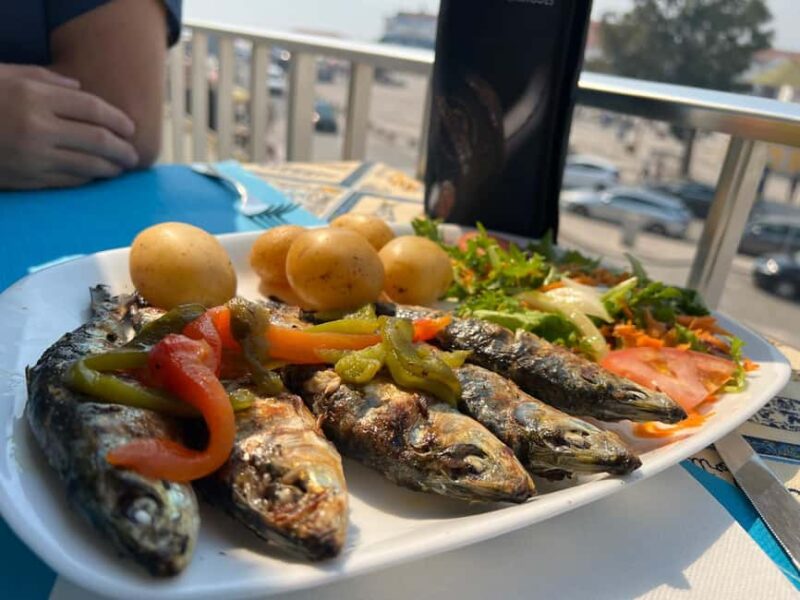 Porto's Flavors & Stories: Food Tasting with Friends - Starting Point at Batalha Square