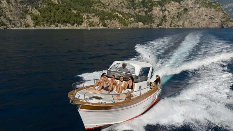 Positano: Amalfi Coast & Emerald Grotto Private Boat Tour - Navigating Along the Amalfi Coast