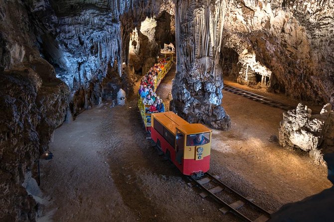 Postojna Cave with Train Ride and Predjama Castle Half Day Trip from Ljubljana - Discovering Postojna Cave’s Stalactites and Stalagmites