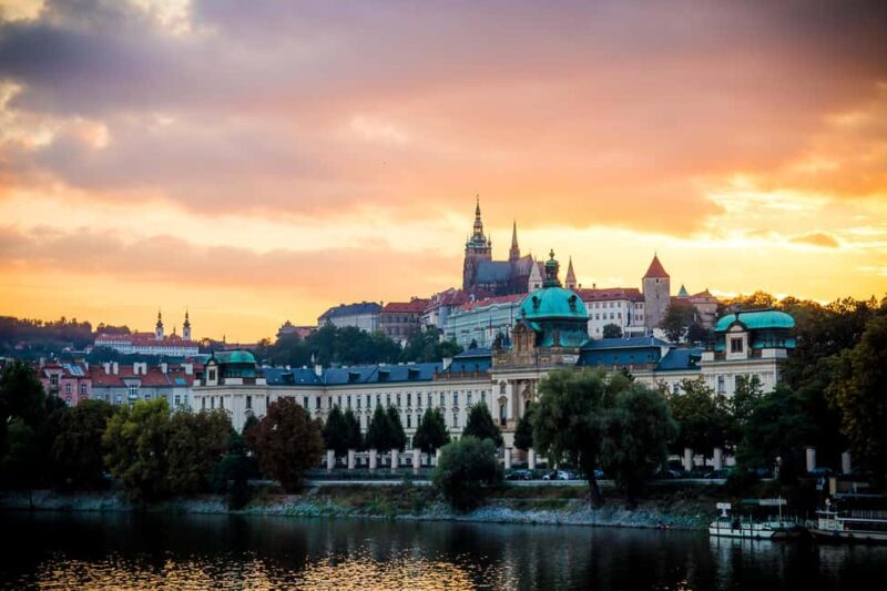 Prague: Golden Hour Walking Tour with Photos - Visiting a Viewpoint for a Panoramic Photo