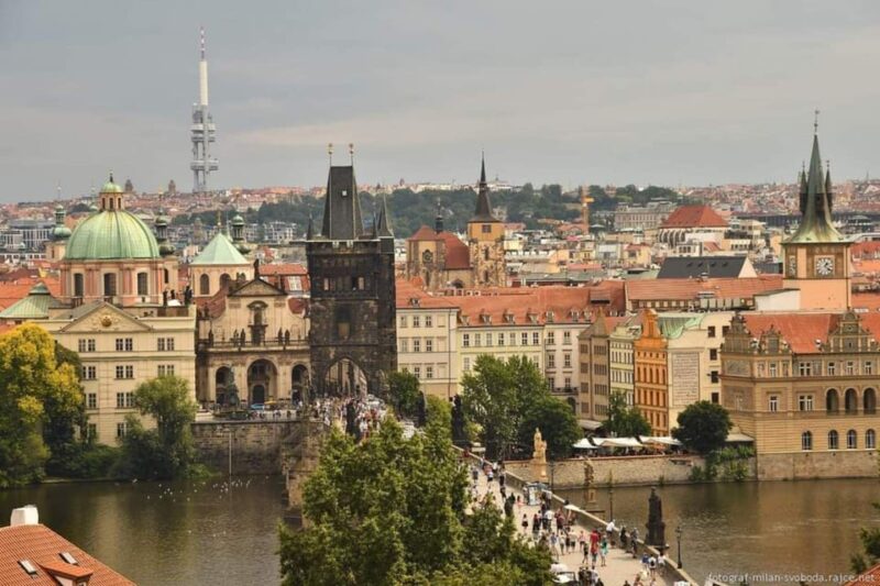 Prague: Hidden Gems Walking Tour with Local Guide - Crossing the Charles Bridge and the John Lennon Wall