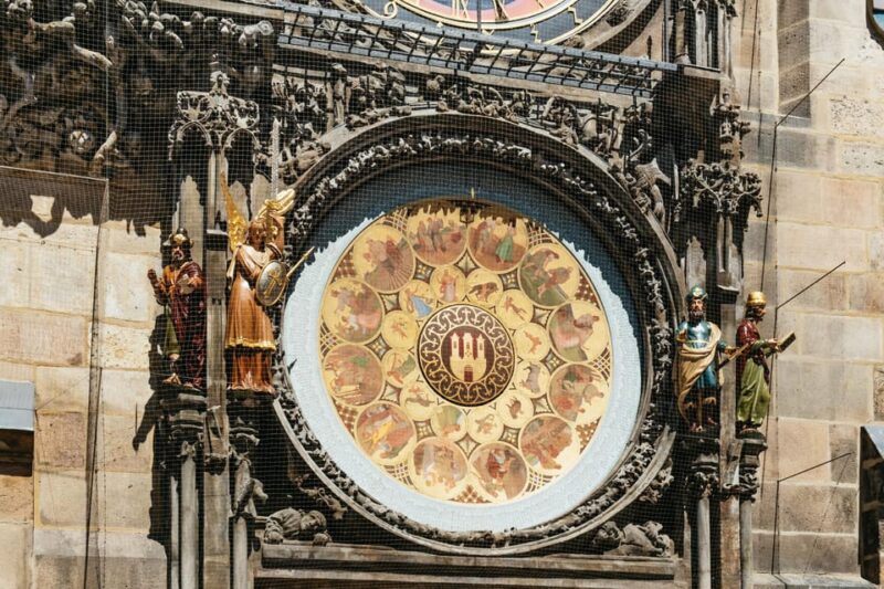 Prague: Old Town, Astronomical Clock and Underground Tour - Walking Across Charles Bridge and Its Legends