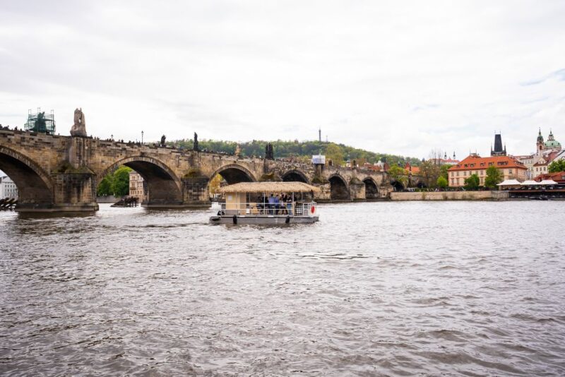 Prague: Party Tiki Boat Sightseeing Cruise with Drinks - Practical Details: Meeting Point, Duration, and Cancellation Policy