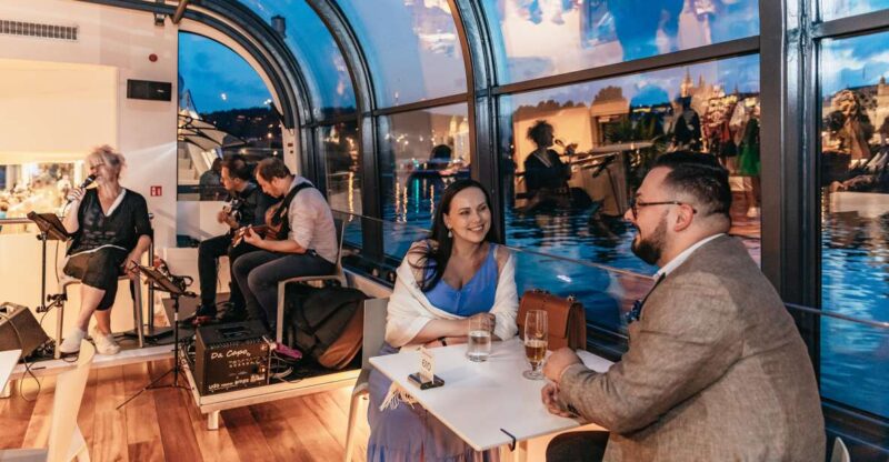 Prague: Sightseeing Dinner Cruise on Open-Top Glass Boat - The Live Music and Atmosphere Onboard
