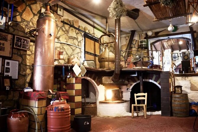 Premium Cretan Olive Oil Tasting, Wine, Raki and Local Food Tour - Discovering Raki at Stironas: Traditional Distillery Visit