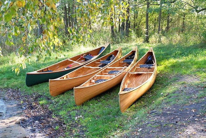 Premium guided Canoe Tour in lake Plateliai Handcrafted inventory and picnic set - Key Points