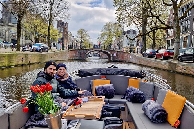 Private 90 Minute Amsterdam Canal Belt Exploration Cruise - Passing the Vibrant Flower Market and Amstel River Highlights