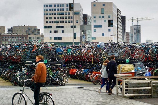 Private Amsterdam Bike Tour with a local guide (also for families) - Guide Expertise and Guest Experience
