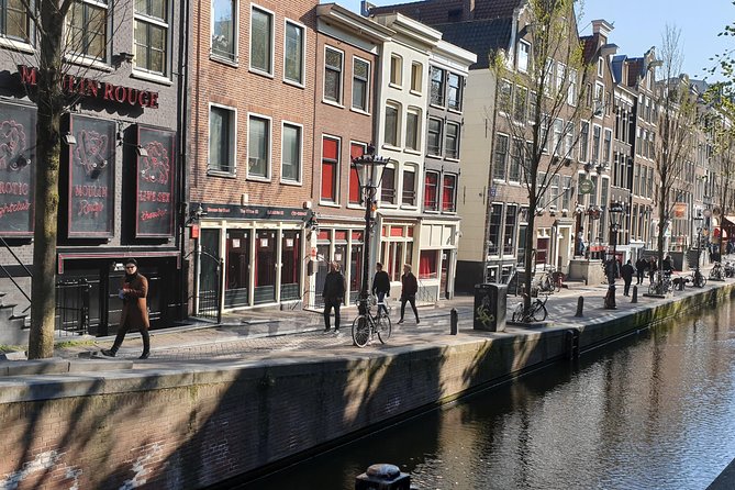 Private Amsterdam Red Light District tour in Spanish - Discovering Amsterdam’s Cultural and Commercial History