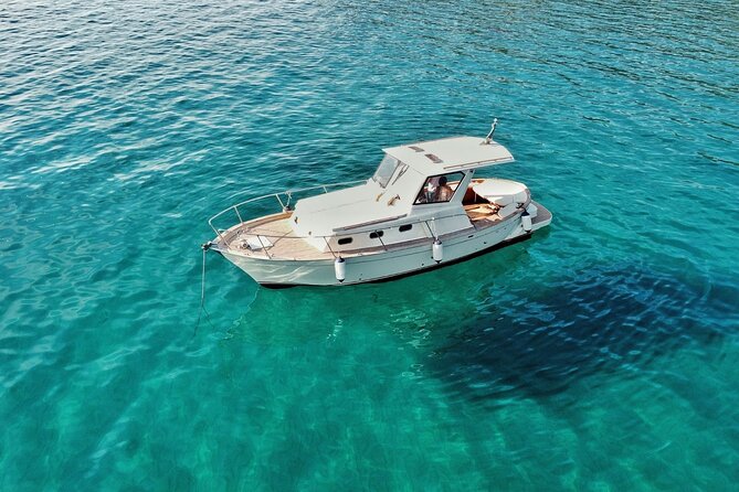 Private Boat Excursion with Lunch or Aperitif to the Calette di Scarlino - Cala Martina: Wild and Rich in Marine Life