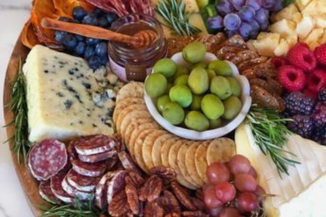 Private boat tour Giardini Naxos Taormina with platter and wine - Scenic Views of Taormina’s Iconic Landmarks and Lively Streets