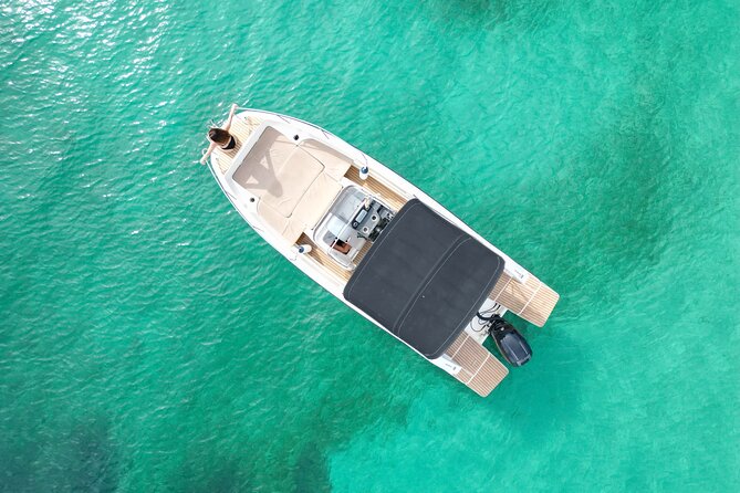 Private Boat Tour of San Antonio with Paddel surfing and Snorkeling - Port des Torrent: First Stop for Swimming and Paddle Surfing